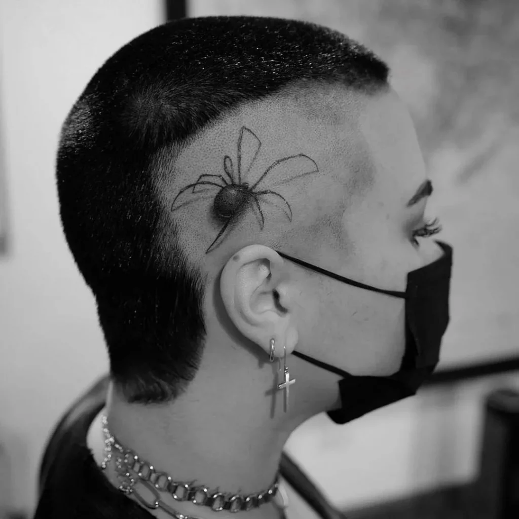 Demi Lovato’s Spider Head Tattoo1